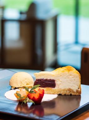 Plate of cake decorated with fruit